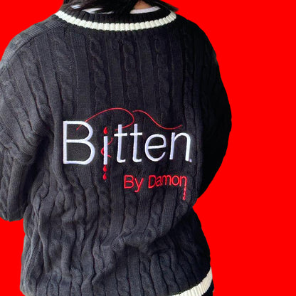 Vampires in red and black varsity sweater