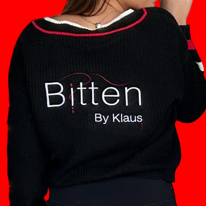 Vampires in red and black varsity sweater